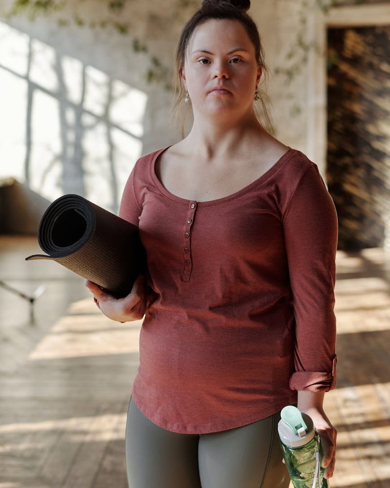 Spacious, sunlit room ready for a yoga session.